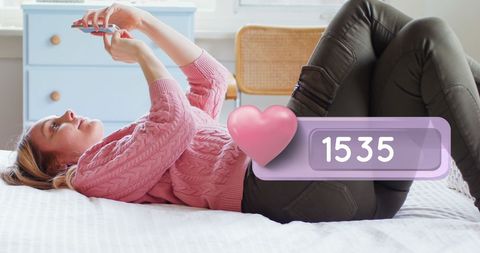 Woman Resting on Bed Using Smartphone with Social Likes Overlay