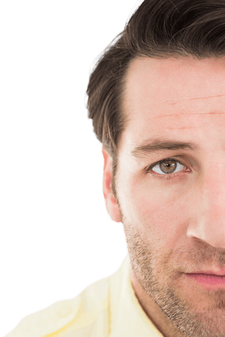 Close-up portrait of unsmiling man on transparent background