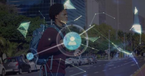 african american man interacting with digital interfaces outdoors - Download Free Stock Images Pikwizard.com