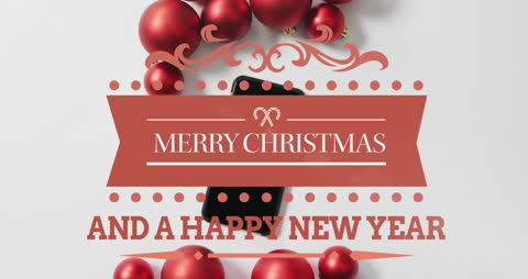 Festive Christmas Greeting with Ornaments and Smartphone