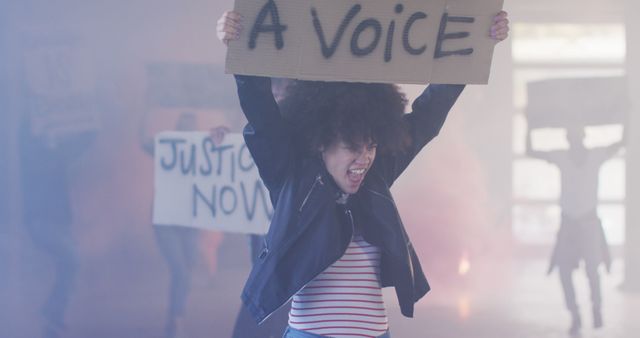 Passionate Activist Holding Sign During Protest - Download Free Stock Images Pikwizard.com