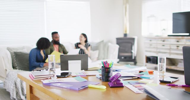 Cozy Remote Workspace with Diverse Team Planning Together - Download Free Stock Images Pikwizard.com