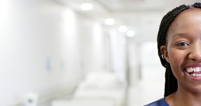 Smiling Nurse in Modern Hospital Corridor - Download Free Stock Images Pikwizard.com