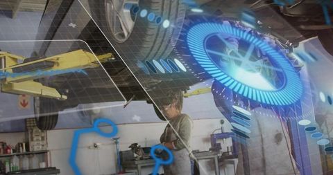 Female mechanic using augmented reality to inspect car undercarriage in modern garage workshop