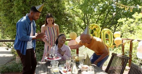 Joyful Birthday Celebration in Sunny Garden