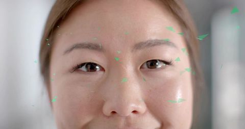 Close-Up Futuristic Facial Scan with Triangular Fragments