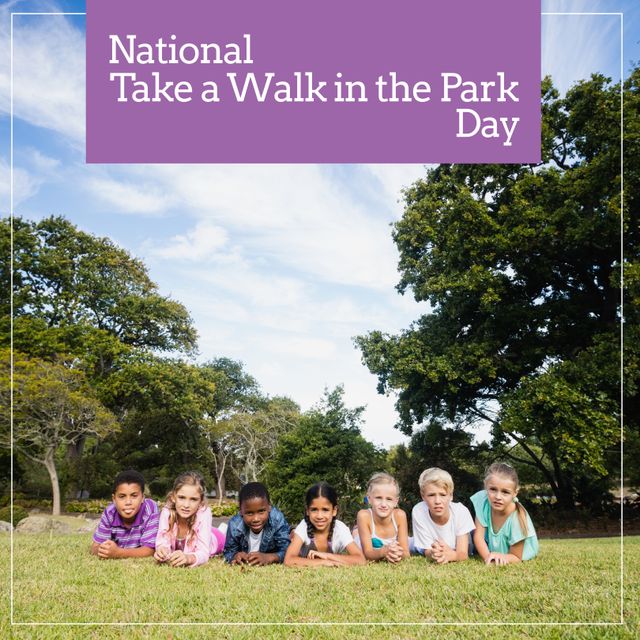 This cheerful image shows diverse children lying on the grass in a park, enjoying National Take a Walk in the Park Day. Simple ways to use this image include promoting outdoor activities, publicizing parks and recreational spaces, or celebrating diversity and childhood in a natural setting.