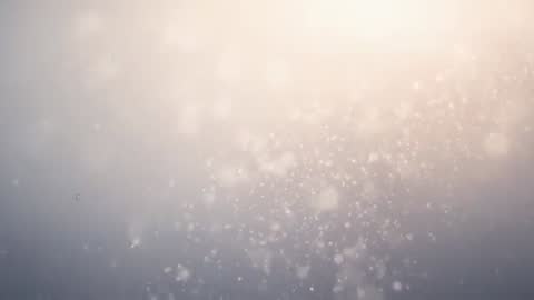 Drifting Warm Bokeh Particles Through Soft Light Halo — Ambient Abstract Motion Loop