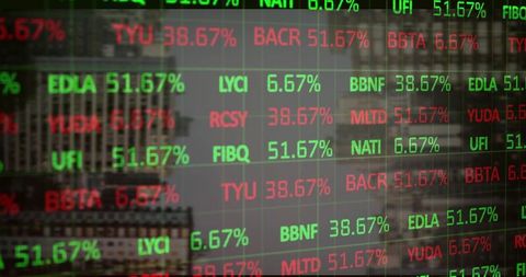 Dynamic Stock Ticker Displaying Financial Data on Glass Panel