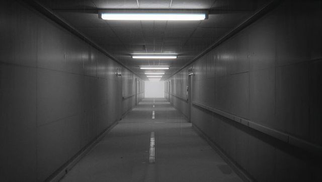 Modern minimalistic corridor with vanishing perspective lighting