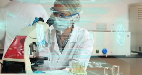 Research scientist analyzing samples with advanced technology in laboratory