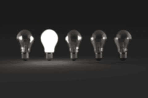 Transparent Glowing Light Bulb with Dim Bulbs in Dark Background - Download Free Stock Videos Pikwizard.com