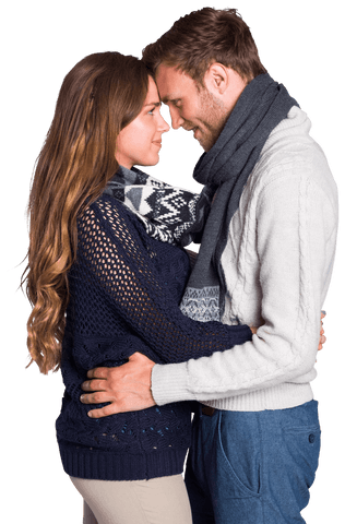 warm embrace captures young couple sharing close, intimate moment in cozy winter attire. ideal for expressing love and affection themes, perfect for relationship blogs, romantic greeting cards, winter fashion promotions.