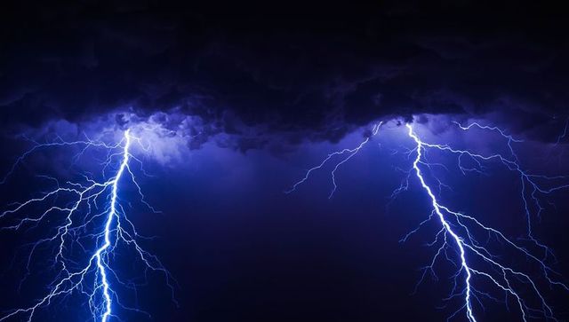 Dramatic Electrical Storm with Lightning Illuminating Clouds
