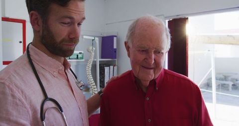 Doctor Discussing Examination Results with Senior Male Patient in Medical Clinic - Download Free Stock Images Pikwizard.com