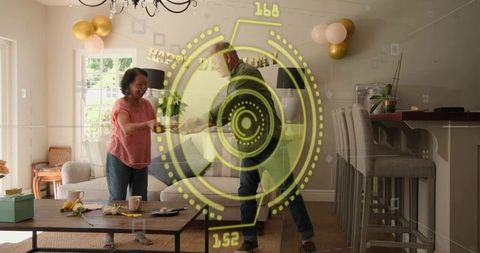 Mother and son exchanging gift in living room with futuristic hud birthday celebration