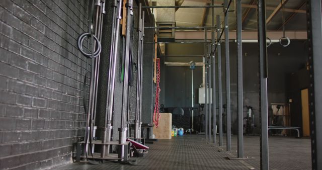 Empty Gym with Barbells and CrossFit Equipment in Urban Warehouse - Download Free Stock Images Pikwizard.com