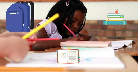 Schoolgirl Focusing on Writing with Educational Icons Overlay