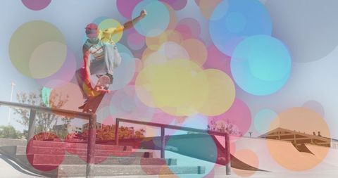 Vibrant skateboarding with graffiti spheres overlay
