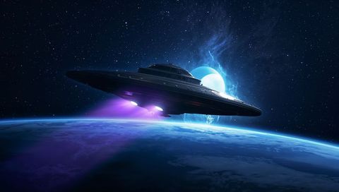 Ufo gliding above earth with mystical purple light