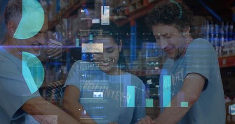 Volunteers Collaborating with Data Analytics Overlay at Warehouse