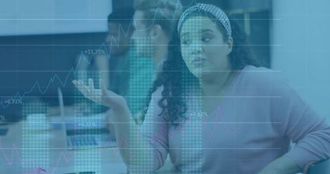 Businesswoman Discussing Digital Analytics in Modern Office