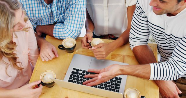 Group of Friends Enjoying Coffee Around Laptop - Download Free Stock Images Pikwizard.com