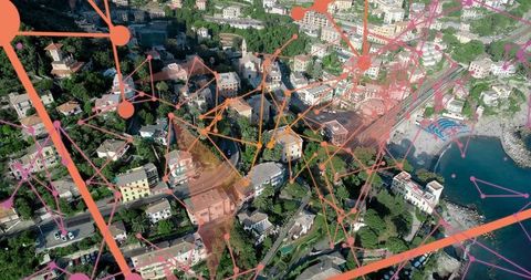 Aerial mediterranean village with digital connectivity overlay