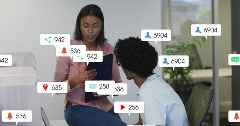 Office Colleagues Analyzing Social Media Engagement