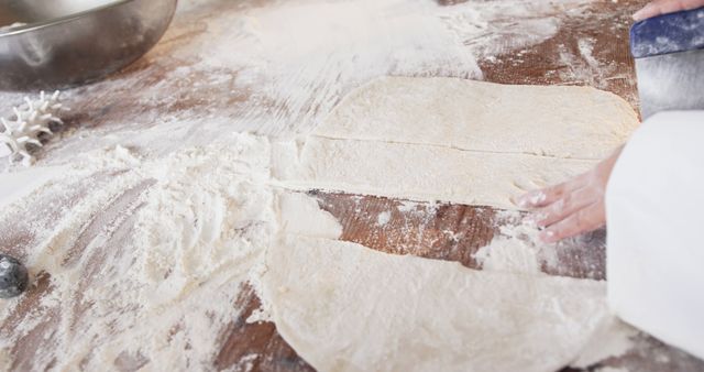 Hands Kneading Dough on Floured Wooden Surface for Baking - Download Free Stock Images Pikwizard.com