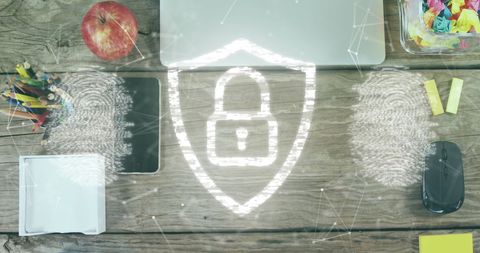 Digital security lock with office tools on wooden desk