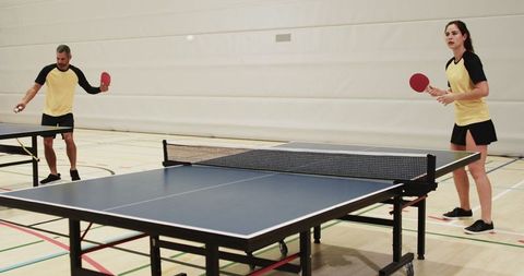 Doubles game of table tennis competitive duo in action
