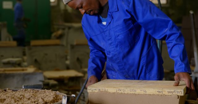 African Artisan Working on Craft Project in Workshop - Download Free Stock Images Pikwizard.com