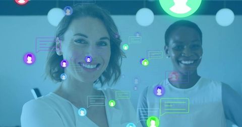 Businesswomen engaging in virtual communication with chat interface icons