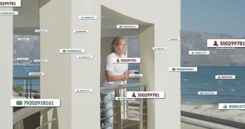 Man Drinking Coffee on Seaside Balcony with Virtual Social Media Icons