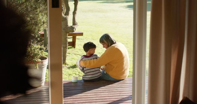 Parent and Child Bonding Outdoors on Wooden Deck - Download Free Stock Images Pikwizard.com