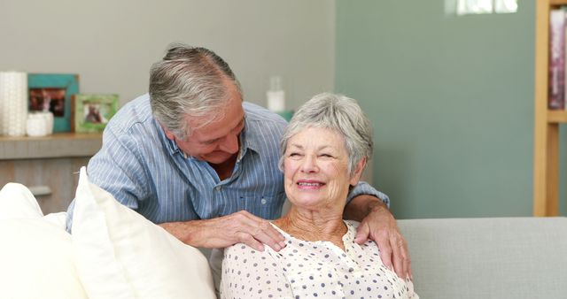 Elderly Couple Enjoying Time Together on Couch - Download Free Stock Images Pikwizard.com