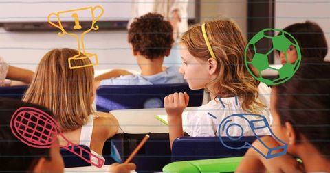 Schoolgirl listening at desk with yellow headband and playful sports doodles