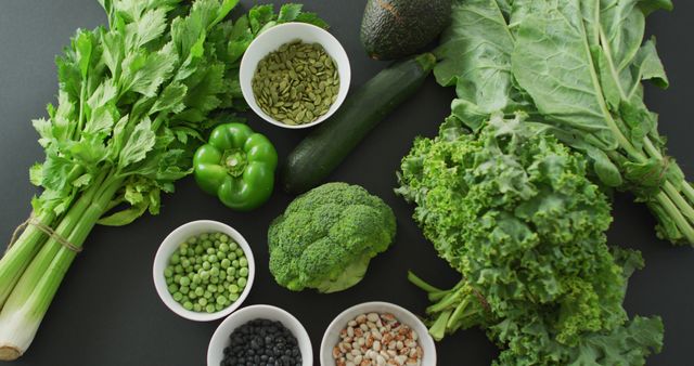 Image of green fresh vegetables with copy space over green background. fusion food, fresh vegetables and healthy eating concept.