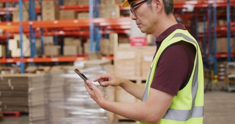 Warehousing Manager Using Smartphone in Industrial Environment - Download Free Stock Images Pikwizard.com