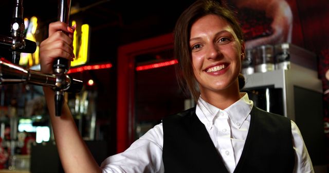 Cheerful Female Bartender Serving Drinks in Bar - Download Free Stock Images Pikwizard.com