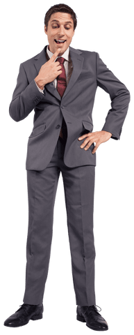 Happy businessman with finger on chin pondering an idea