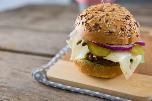 Close up of cheeseburger - Download Free Stock Photos Pikwizard.com
