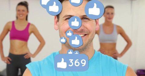 Man in Fitness Studio with Social Media Likes and Activewear
