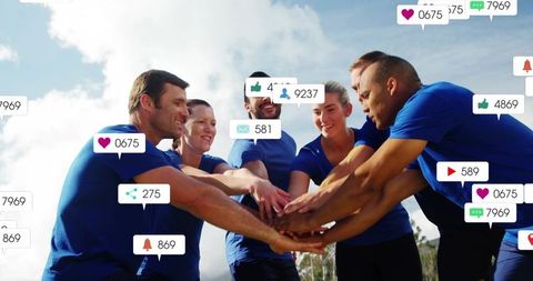 Outdoor team huddle with social media notifications overlay showing unity and engagement