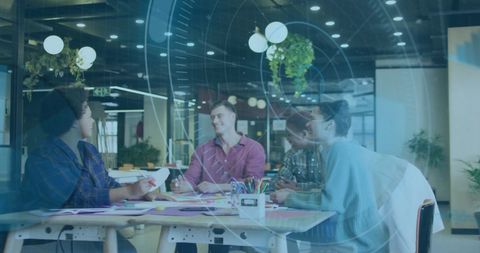 Technology Overlay and Diverse Team Discussing Strategy in Modern Office