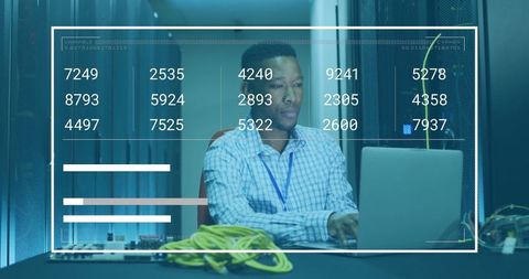 Network Engineer Analyzing Data in Modern Server Room