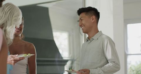 Elegant Wedding Reception with Guests Socializing Indoors