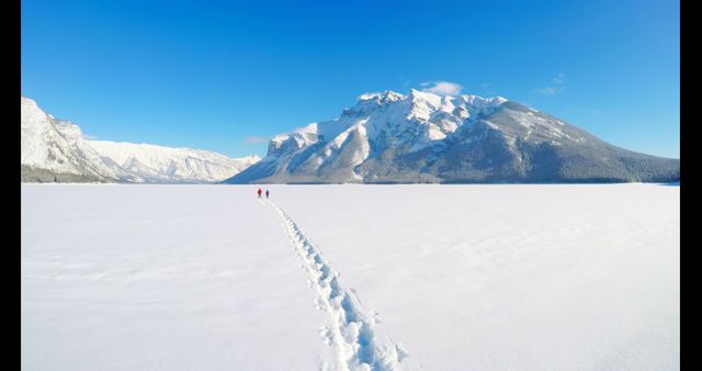 Snow-Covered Mountain Adventure with Hikers Indie Walkway - Download Free Stock Images Pikwizard.com