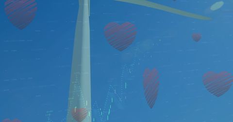 Wind turbine with hearts symbolizing love for renewable energy